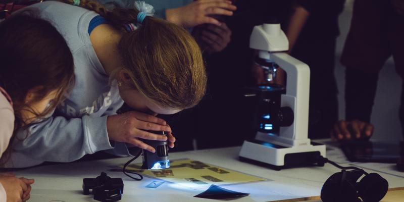 Photo about a microscope workshop during the Night of Science 2025.